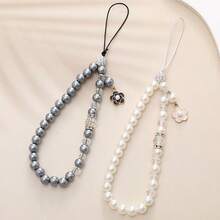 2 Estilos Correa de Muñeca para Teléfono con Cuentas de Perlas Falsas y Flores, Elegante Cordón para Teléfono con Cristales de Strass, Decoración para Bolso, Llave y Auriculares para Mujeres y Niñas - Pulsera de perlas y camelias - Ver 3