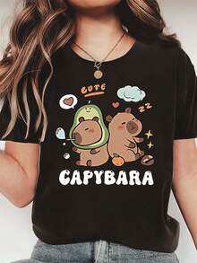 Ideal para ocasiones informales: Camiseta con estampado de capibara - presenta un lindo diseño de capibara con las palabras "CUTE" y "CAPYBARA" impresas, de manga corta, cuello redondo, elas - Negro - Ver 1