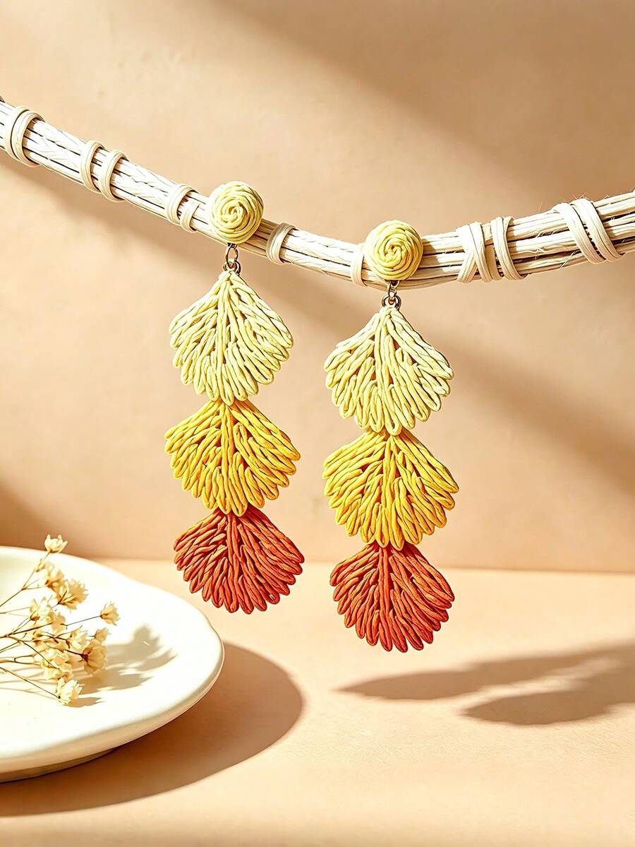 一對波希米亞風拉菲草貝殼耳環，適合夏季海灘穿搭，為您的造型增添氛圍感