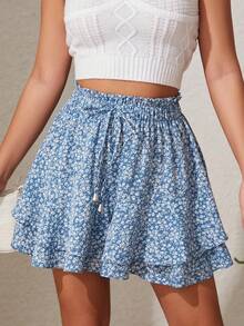 Falda pantalón de doble capa con volantes, cintura elástica y cordón ajustable: un diseño casual y deportivo pensado para evitar exposiciones accidentales. - Camel - Ver 1