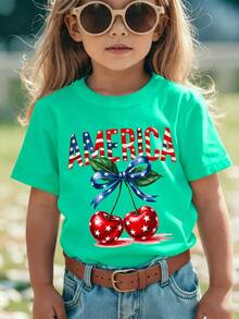 Camiseta de manga corta para niñas de moda de verano 'Día de la Independencia Americana' con elementos de la bandera americana 'AMERICA', estampado de dibujos animados de letras, lazo y cere - Rojo - Ver 9