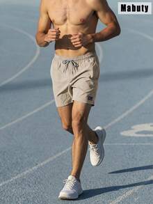 男士運動短褲，彈性運動短褲，附彈性抽繩腰頭與側邊口袋，適合跑步、網球、高爾夫、健身房、健行、健身鍛鍊，夏季穿著 - 卡其色 - 查看 8