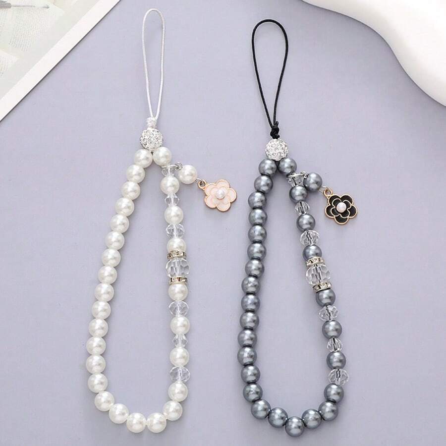 2 Estilos Correa de Muñeca para Teléfono con Cuentas de Perlas Falsas y Flores, Elegante Cordón para Teléfono con Cristales de Strass, Decoración para Bolso, Llave y Auriculares para Mujeres y Niñas - Pulsera de perlas y camelias - Ver 1