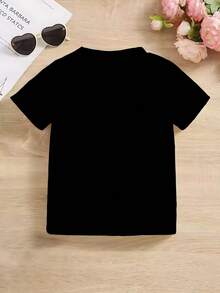 Camiseta de George Washington para niños - Estilo divertido de dibujos animados, que muestra a Washington con un sombrero tricornio azul, vestido con traje militar azul, sosteniendo un gran - Blanco - Ver 10