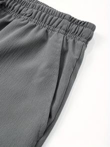 1 Unidad Pantalones Hombre Texturizados Color Sólido Corte  Holgado, Ligeros Transpirables Multiestación, Ideal Uso Diario, Playa, Running y Golf Estilo Vacacional - Gris Oscuro - Ver 4
