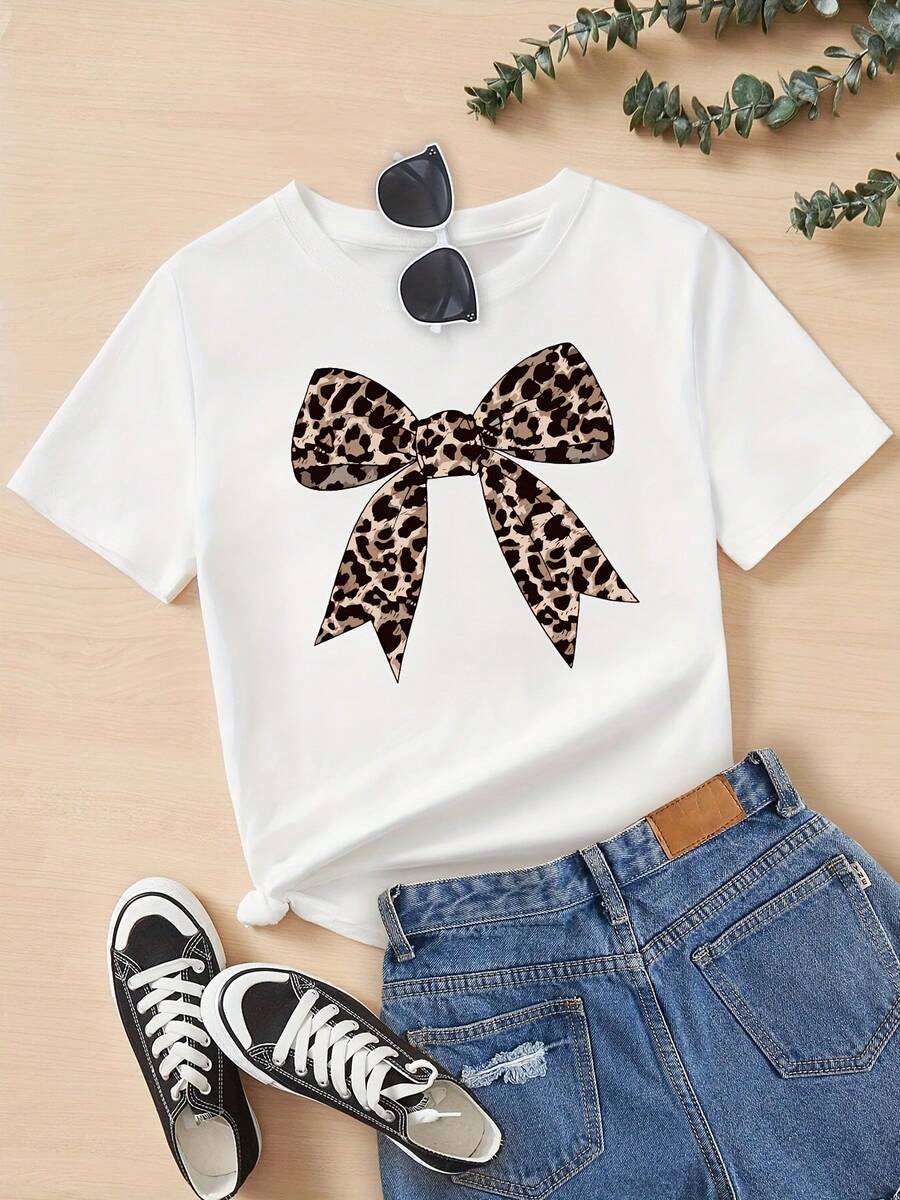 Camiseta con estampado de dibujos animados y lazo con estampado de leopardo, camiseta de manga corta con cuello redondo para niñas, ropa de verano para niñas, adecuada para edades de 8 a 14 - Blanco - Ver 1