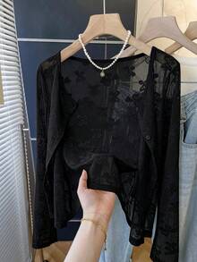 Chaqueta informal, versátil y ligera con estampado de mariposas en jacquard. - Negro - Ver 4