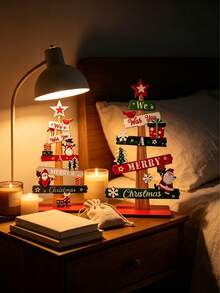 1 món trang trí cây thông Noel để bàn bằng gỗ sáng tạo, in chữ "We Wish You Merry Christmas", họa tiết vẽ ông già Noel & người tuyết/hộp quà, đồ trang trí lễ hội tự đứng trưng bày trên bàn tại nhà - Xem 4