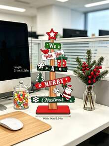 1 món trang trí cây thông Noel để bàn bằng gỗ sáng tạo, in chữ "We Wish You Merry Christmas", họa tiết vẽ ông già Noel & người tuyết/hộp quà, đồ trang trí lễ hội tự đứng trưng bày trên bàn tại nhà - Xem 10