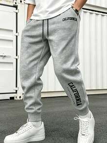 Pantalones de chándal ligeros y sueltos con cordón elástico para hombres, estampado con letras de moda - gris plomo - Ver 12