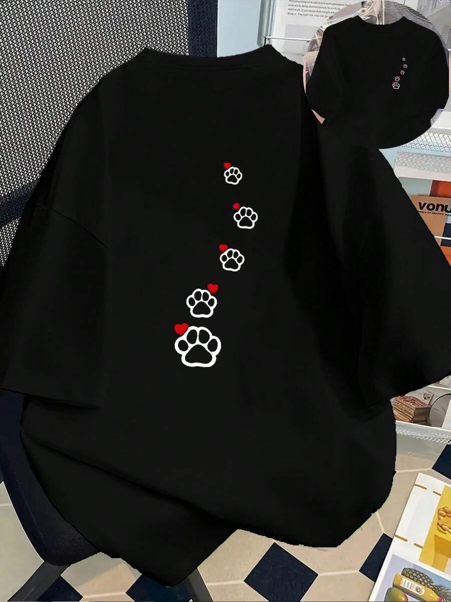 Camiseta de mujer con estampado frontal y trasero de huellas de pata de perro y corazones, elegante camiseta casual de manga corta con cuello redondo, para uso diario en todas las esta - Negro - Ver 1