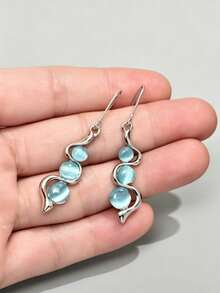 1 Pair Creative Curved Wave-Shaped Inlaid Aquamarine Cat Eye Gemstone Swinging Earrings - Blue - View 1