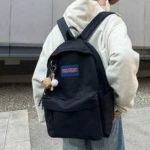 A Unisex, Plain, Large-Capacity Backpack For High School Students. It Features A Simple And Versatile Design With Multiple Pockets. - Black - View 1