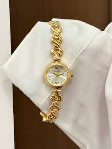 Jam tangan wanita yang elegan dan klasik ini menampilkan desain oval, pengerjaan yang indah, dan gaya yang unik. - Emas - View 3
