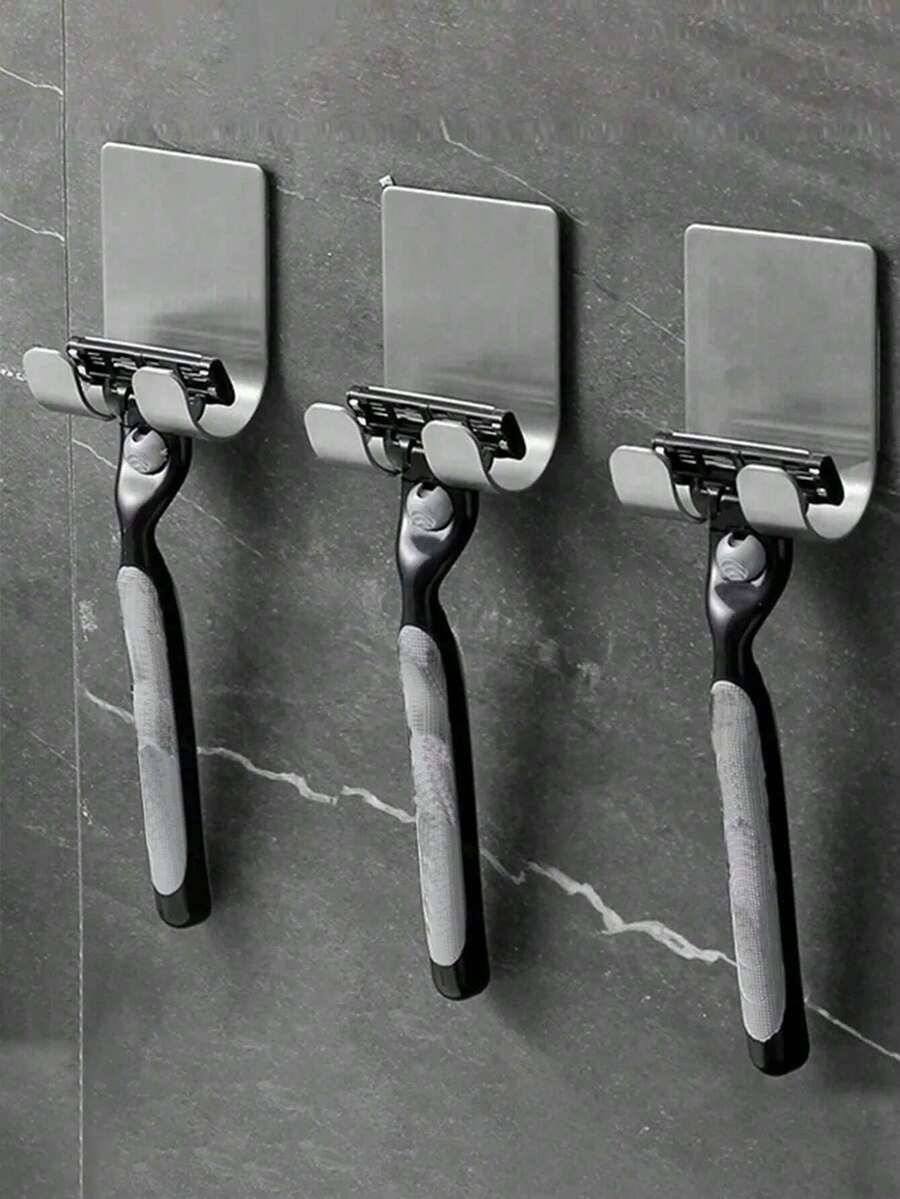 Soporte moderno para afeitadora de baño, gancho de ducha multifunción de acero inoxidable a prueba de óxido, estante de almacenamiento de accesorios de baño, sin necesidad de perforar. Diseño de doble gancho que ahorra espacio, apto para afeitadora, esponja de baño, llaves, bolsas, enchufes, etc. Aplicable para baño, cocina, dormitorio, entrada y pasillo. Accesorio de baño, decoración del hogar.