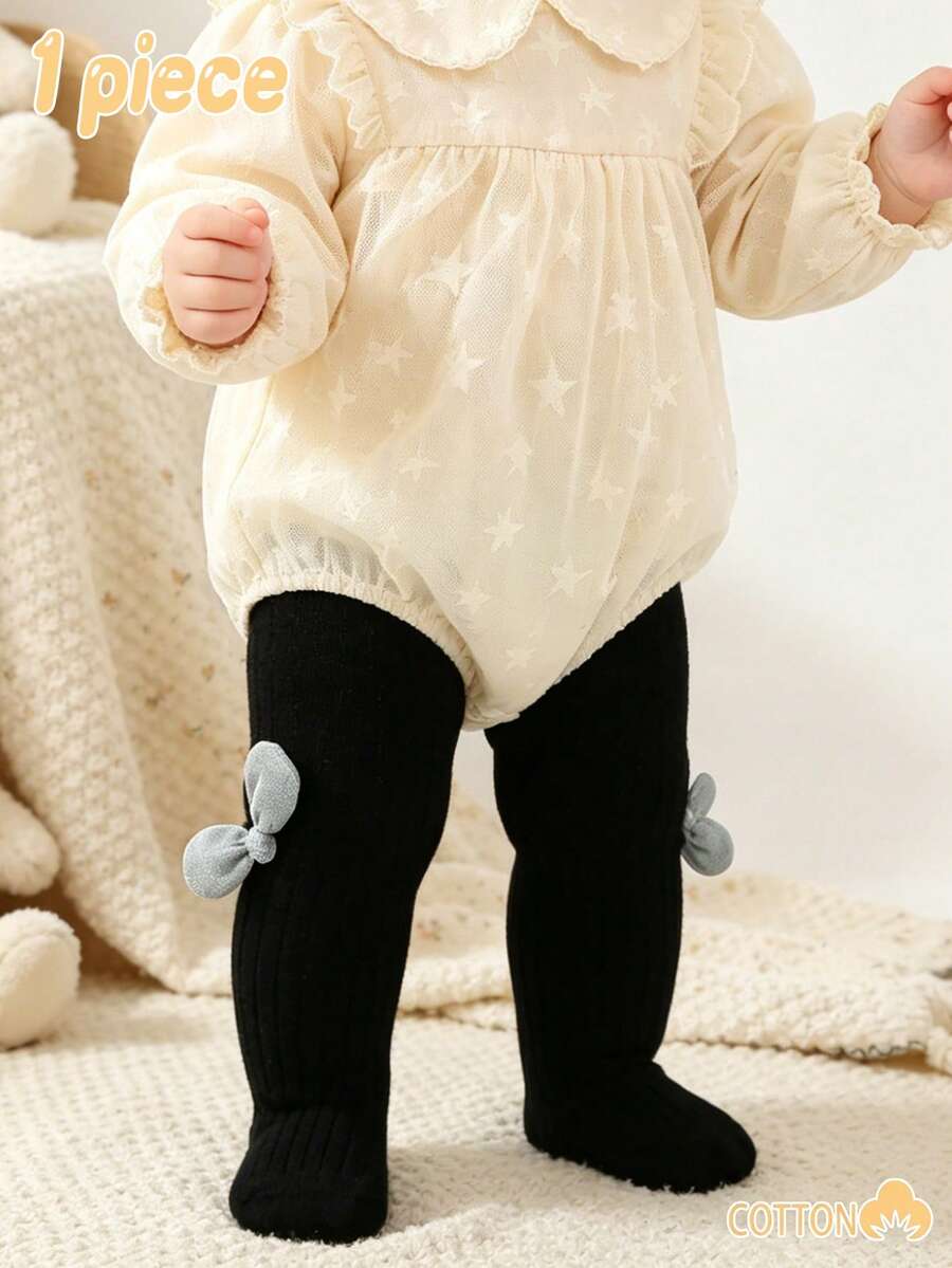 1件女嬰純色柔軟棉質緊身內搭褲，附蝴蝶結裝飾