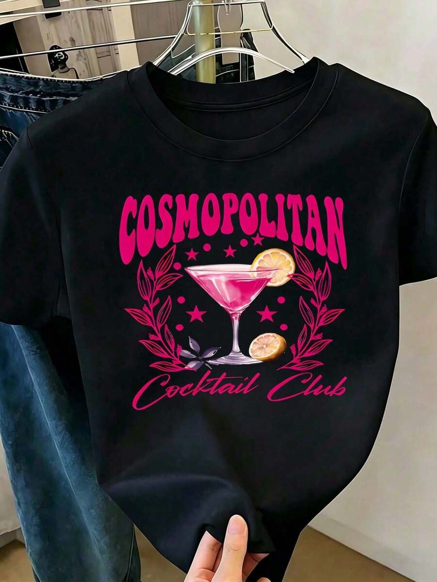Women's Black Cotton T-Shirt With Pink Cosmopolitan Cocktail Print, "Cosmopolitan Cocktail Club" Text, Lemons And Leaf Details, Chic, Fun And Modern Style, Ideal For S - Hitam - View 1