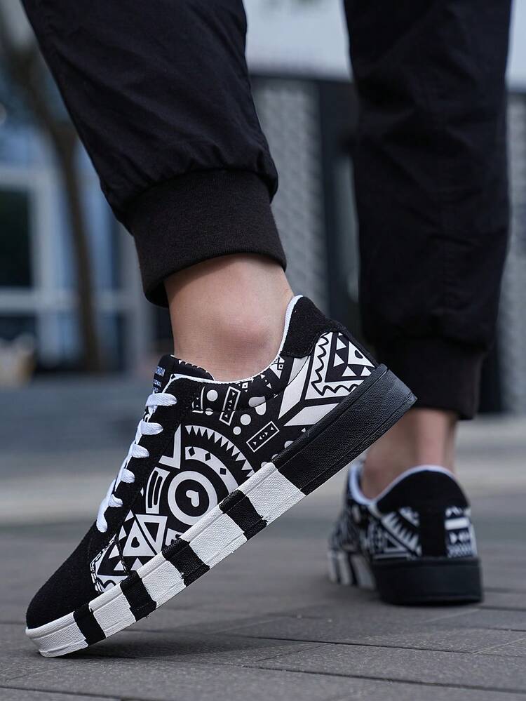 Men's Fashion Front Lace-Up Black & White Contrast Color Full Print Letter Random Graffiti Canvas Casual Skate Shoes - White and Black - View 1