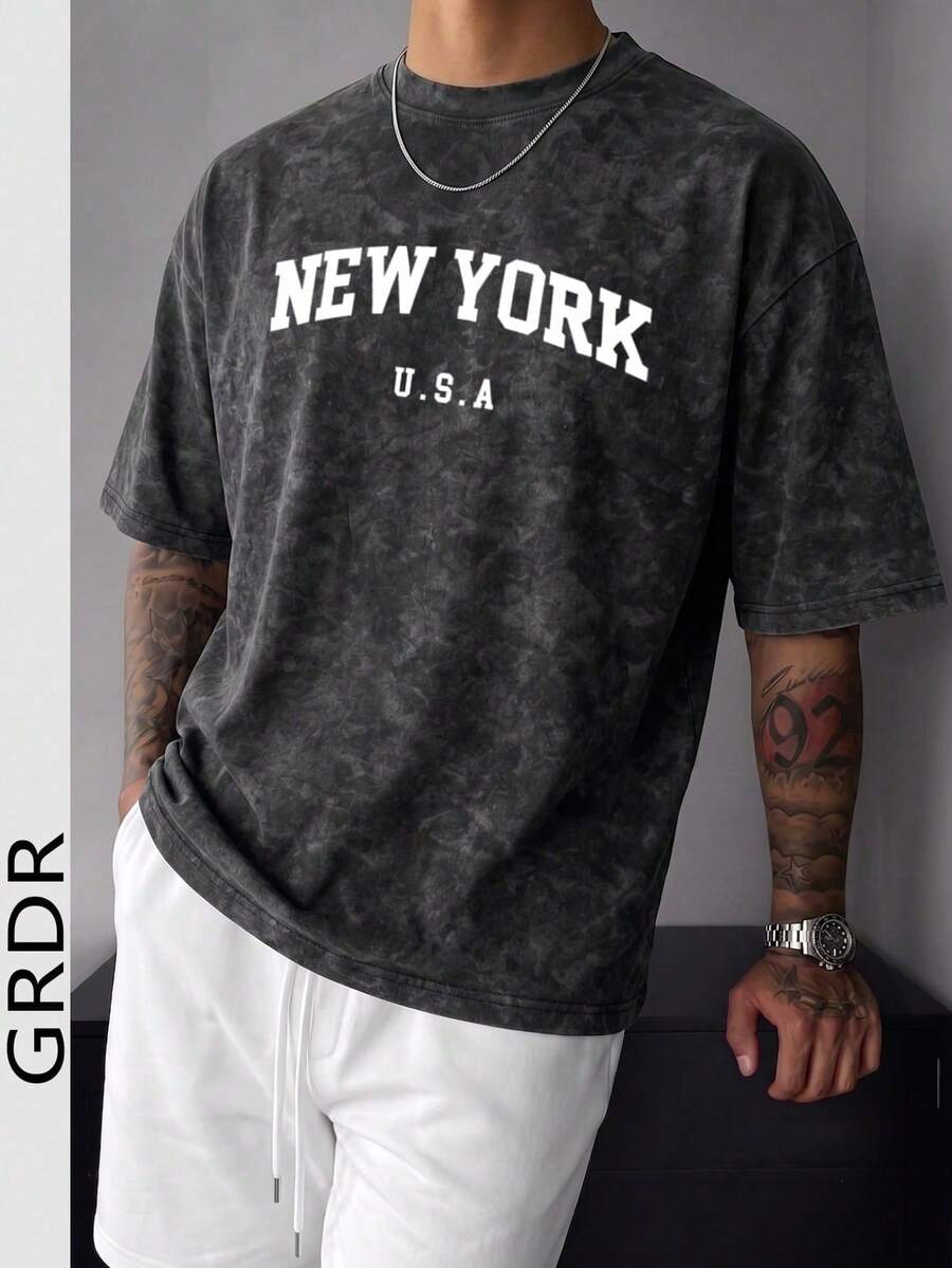 Camiseta de manga corta con cuello redondo y estampado gráfico de Nueva York para hombre GRDR, cómoda y a la moda. - Negro - Ver 1
