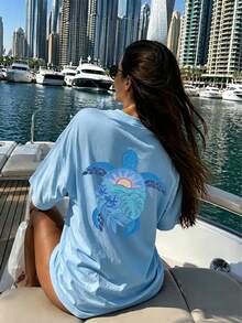 Short-Sleeved T-Shirt With A Sea Turtle Print, Minimalist And Modern Style, Perfect For Summer.Versatile And Ideal For Women. - Blue - View 1