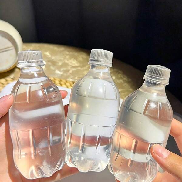 Botella de bebida realista con forma de botella, suave y transparente, para aliviar el estrés de adultos, botella de agua suave, juguete de botella de agua realista, botella transparente suave, botella de bebida suave, alivio del estrés deformable, alivio del estrés para adultos, suave al apretar, transparente y húmeda suave, alivio del estrés al apretar que puede aliviar la ansiedad, juguete sensorial para apretar, juguete cómodo, se puede usar como relleno de caja de regalo, regalo de cumpleaños, recompensa de aula