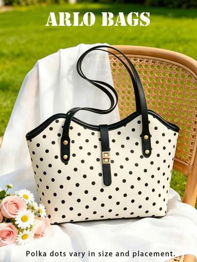 Spacious Tote Bag With Classic Black And White Polka Dot Print, Contrasting Black Leather Trim And Stylish Gold Lock. The Relaxed Yet Structured Shape Makes It Perfect For Work, Travel Or Daily Use, Combining Vintage Charm And Practical Function.