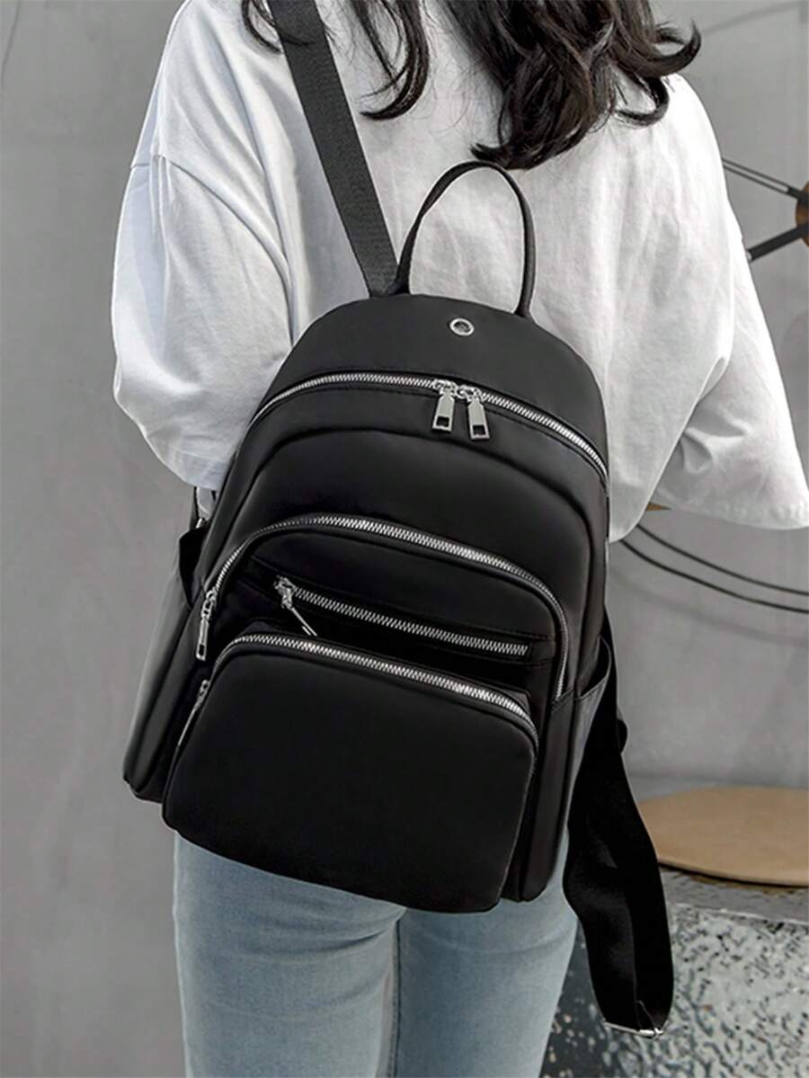 Mochila minimalista impermeable, liviana y portátil con funciones para graduados, chicas adolescentes, estudiantes universitarios y de secundaria de primer, segundo, tercer y cuarto año. Per - Negro - Ver 1