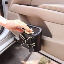 Poubelle de voiture suspendue à la porte avec cadre blanc et nœud mignon, couvercle à pression, mini poubelle de voiture, organisateur de rangement multifonction pour l'intérieur de la voiture, petite poubelle latérale de voiture imperméable, élégante poubelle de voiture avec décoration de nœud noir exclusive pour les femmes conductrices, poubelle de voiture portable avec doublure amovible - poubelle - Voir 3