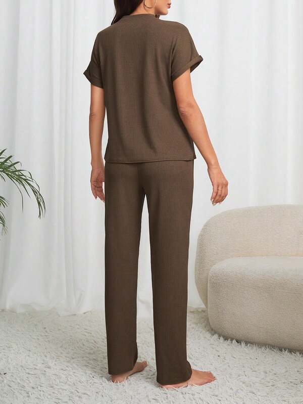 Conjunto de ropa de estar en casa con blusa de mangas murciélago acanalada y pantalones para mujer