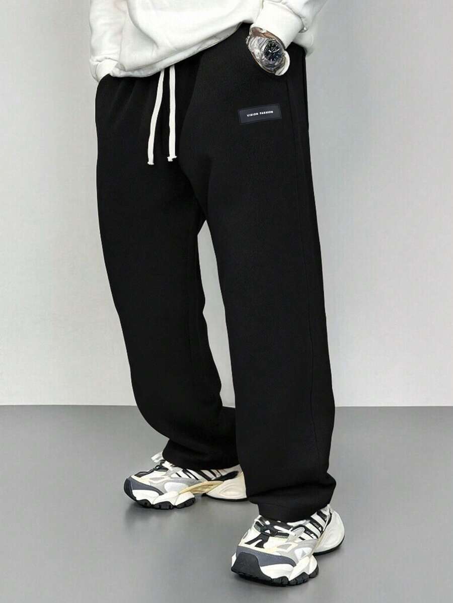 Pantalones casuales minimalistas negros con cordón en la cintura para hombre - Negro - Ver 1