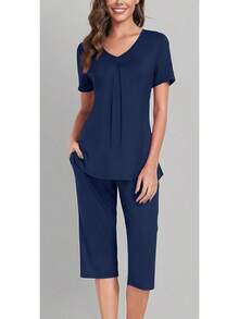 Anyally - Conjunto de pijama de verano para mujer, camisa de manga corta y pantalones capri de 2 piezas, pijama plisado con bolsillos - Malva plisada - Ver 7