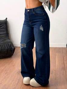 Pantalones rectos de mezclilla azul claro lavados con roturas, cintura media, elásticos y con caída elegante - Azul lavado medio - Ver 2