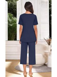 Anyally - Conjunto de pijama de verano para mujer, camisa de manga corta y pantalones capri de 2 piezas, pijama plisado con bolsillos - Malva plisada - Ver 4