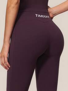 TimeOff Conjunto deportivo de mujer de un solo color con cuello redondo, manga corta, pantalones acampanados de largo medio - Morado - Ver 9