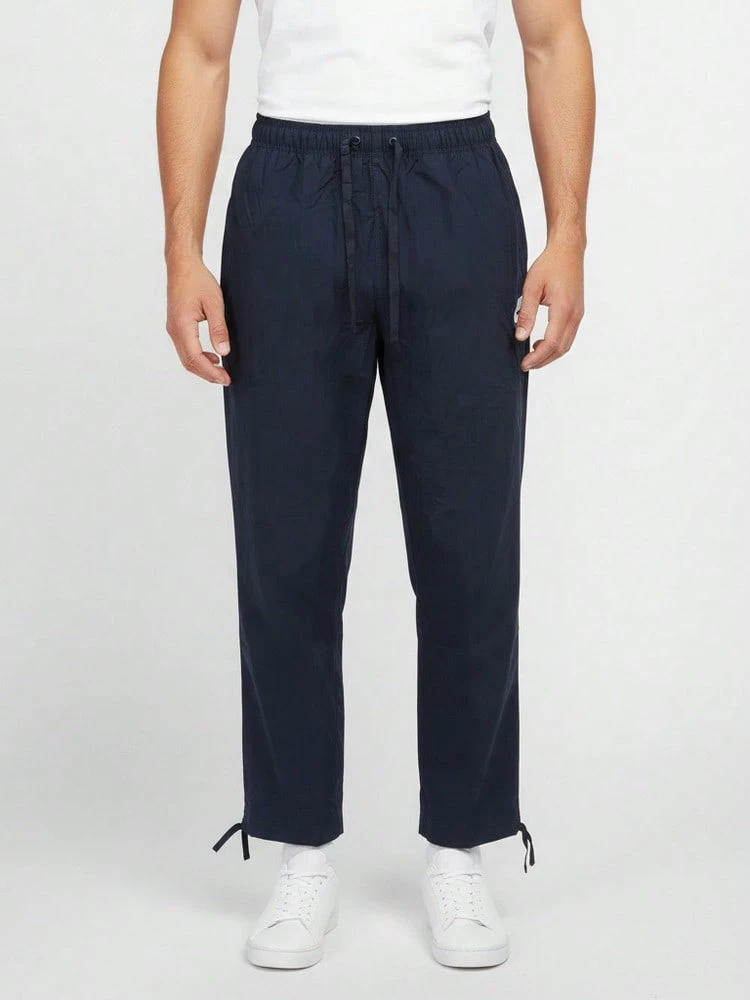 Nike Pantalones largos casuales y versátiles con cintura de cordón para hombres, para uso diario y desplazamientos - Azul - Ver 1