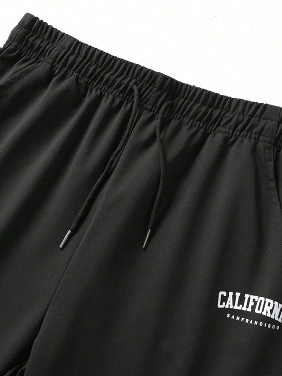 Pantalones de chándal ligeros y sueltos con cordón elástico para hombres, estampado con letras de moda - Negro - Ver 1