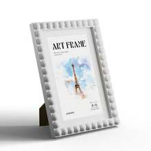 1个卷轴式相框（4x6/6x8/8x10/A3尺寸），带白色卡纸 - 5种颜色可选（白/黑/黄/蓝/紫），适用于家居和办公室装饰 - 可放置于桌面或悬挂于墙上 - 普通款 - 查看 31