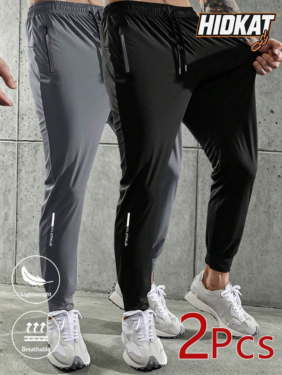 2pcs Men's Fashionable Loose Fit Sports Pants With Zipper Pockets, Quick-Dry Drawstring Elastic Waist Pants, Suitable For Hiking, Jogging, Cycling, Outdoor Fitness, With Reflective Design Spring