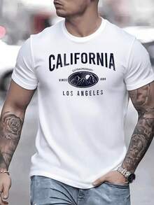 Monta?as bajo el sol naciente simbolizan la libertad de California en esta genial camiseta de hombre para lucir un aire muy veraniego - Blanco - Ver 1