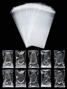 200pcs OPP Transparent Dust-Proof Plastic Self Adhesive Bags, Homemade Transparent Ice Pack Bag, Long Ice Cream Bags, Use For Small Accessories, Baking, Keychains, Pendants, Cards, Holiday Gift Packaging Supplies, Transparent Storage Bags,Halloween Decorations,Halloween Party Supplies,Christmas Decorations - Clear - View 1