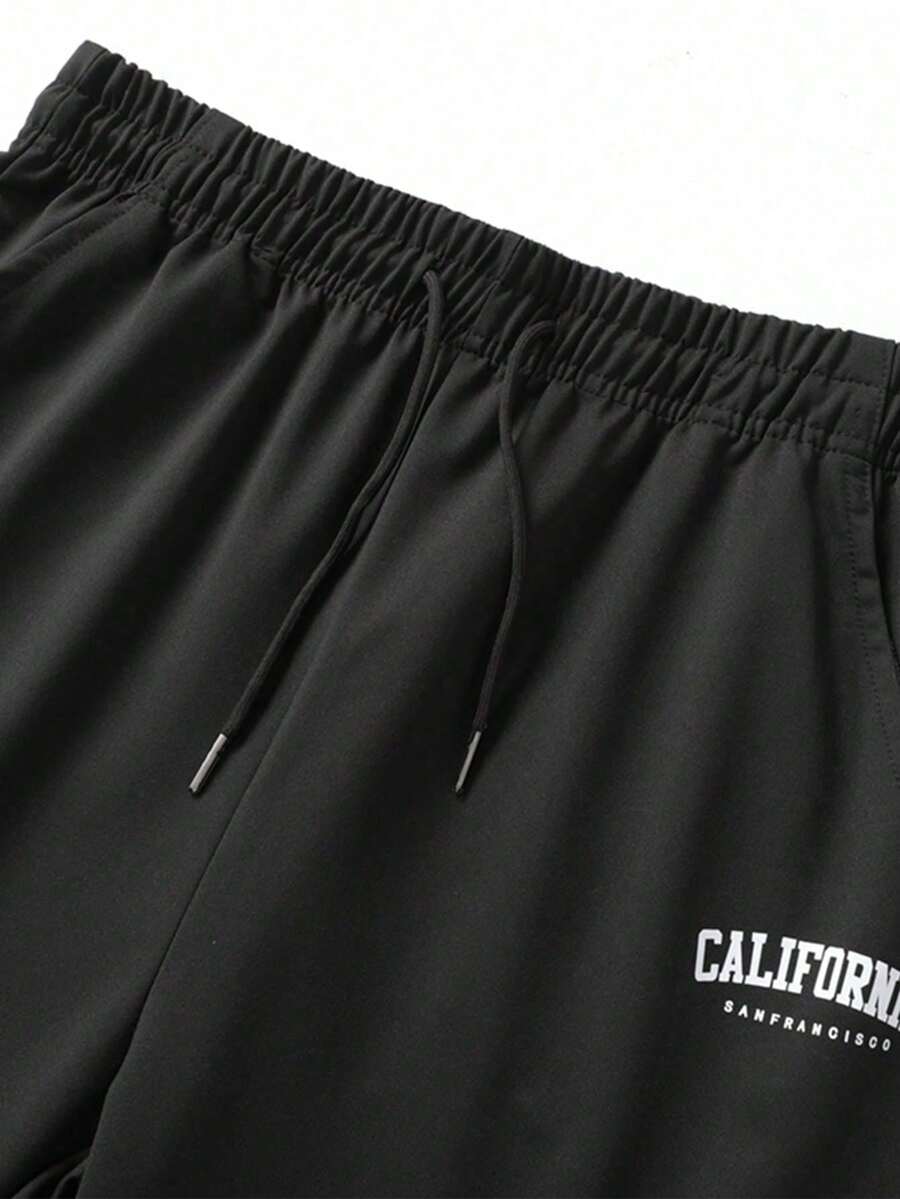 Pantalones de chándal ligeros y sueltos con cordón elástico para hombres, estampado con letras de moda - verde hierba - Ver 1