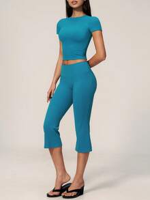 TimeOff Conjunto deportivo de mujer de un solo color con cuello redondo, manga corta, pantalones acampanados de largo medio - Agua verde azul - Ver 7