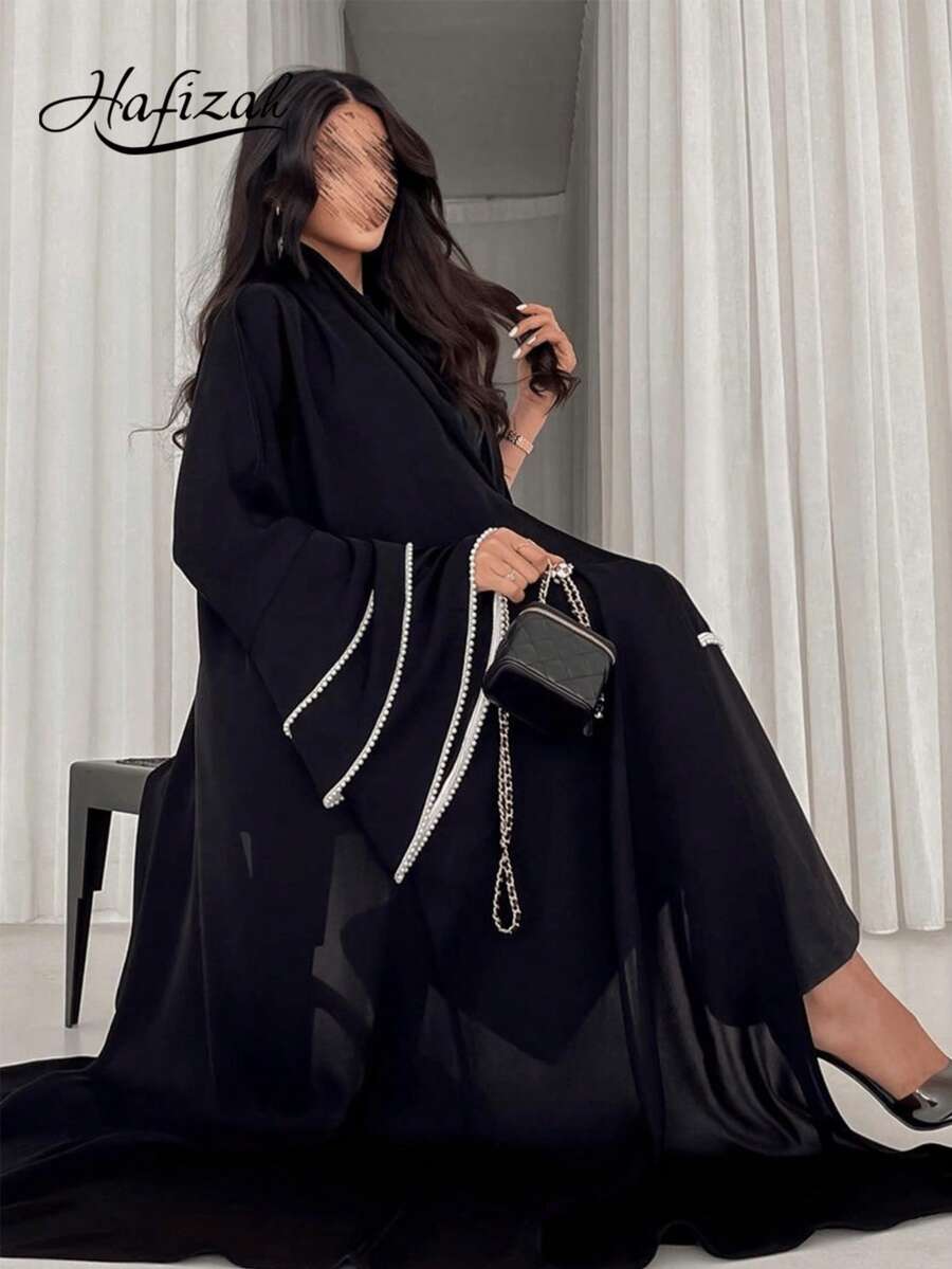 Áo Abaya Ả Rập tay dài màu đen kín đáo với cổ tay áo đính ngọc trai giả, trang phục ngoài thời trang dành cho nữ, áo choàng mùa xuân. - màu đen - Xem 1
