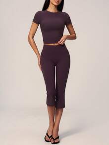 TimeOff Conjunto deportivo de mujer de un solo color con cuello redondo, manga corta, pantalones acampanados de largo medio - Morado - Ver 7