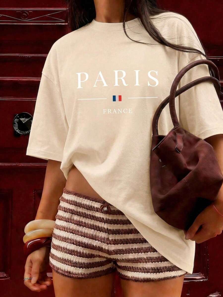 Camiseta Casual para Mujer Impala con Estampado de París, Francia, Mangas Cortas Regulares y Cuello Redondo, Top Ligeramente Elástico para Viajes de Moda, 100% Algodón. - Albaricoque - Ver 1