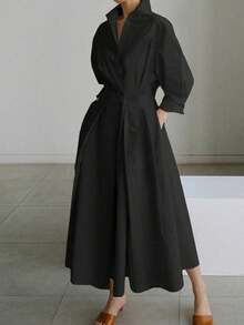 Vestido Camisero Minimalista con Cintura Ceñida, con Diseño de Cuello y Pechera Simple, Mangas 3/4 y Falda Midi en Forma de A. Elegante y Chic sin Esfuerzo para el Trabajo, Negocios Ligeros y Uso Diario. Negro Elegante - Negro - Ver 2