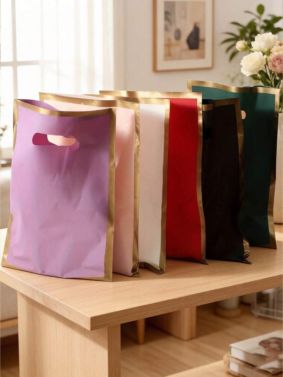 Nuevas bolsas de regalo de plástico con borde dorado y asa plana de 4 dedos, gruesas y duraderas, opciones multicolor, gran resistencia y resistente a desgarros, textura mate premium, adecuadas para almacenamiento a granel y embalaje para tiendas de ropa, distribución de dulces y regalos para fiestas, almacenamiento de recuerdos festivos, compras diarias de artículos pequeños, buena capacidad de carga y no se rompen fácilmente, versátiles y reutilizables - multicolor - Ver 1