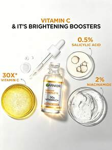 Garnier 卡尼爾亮采維他命C精華液，幫助淡化黑斑、減少色素沉著、增強肌膚光澤並提亮膚色。這款晚間精華液專為改善暗沉、蠟黃肌膚而配方，含10%純維他命C，具有 - 15ml - 查看 4