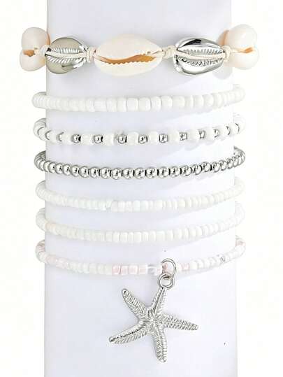 Conjunto de 7 pulseiras/tornozeleiras elásticas com estilo praiano, decoradas com conchas e estrelas-do-mar.