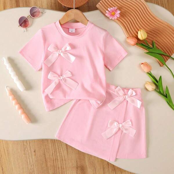 Conjunto de falda con lazo y blusa de moda de verano para niñas, blusa de cuello redondo de manga corta con falda de dobladillo asimétrico, conjunto informal de camiseta para niñas de 4 a 7 años, adecuado para uso diario, al aire libre, calle, escuela y fiestas